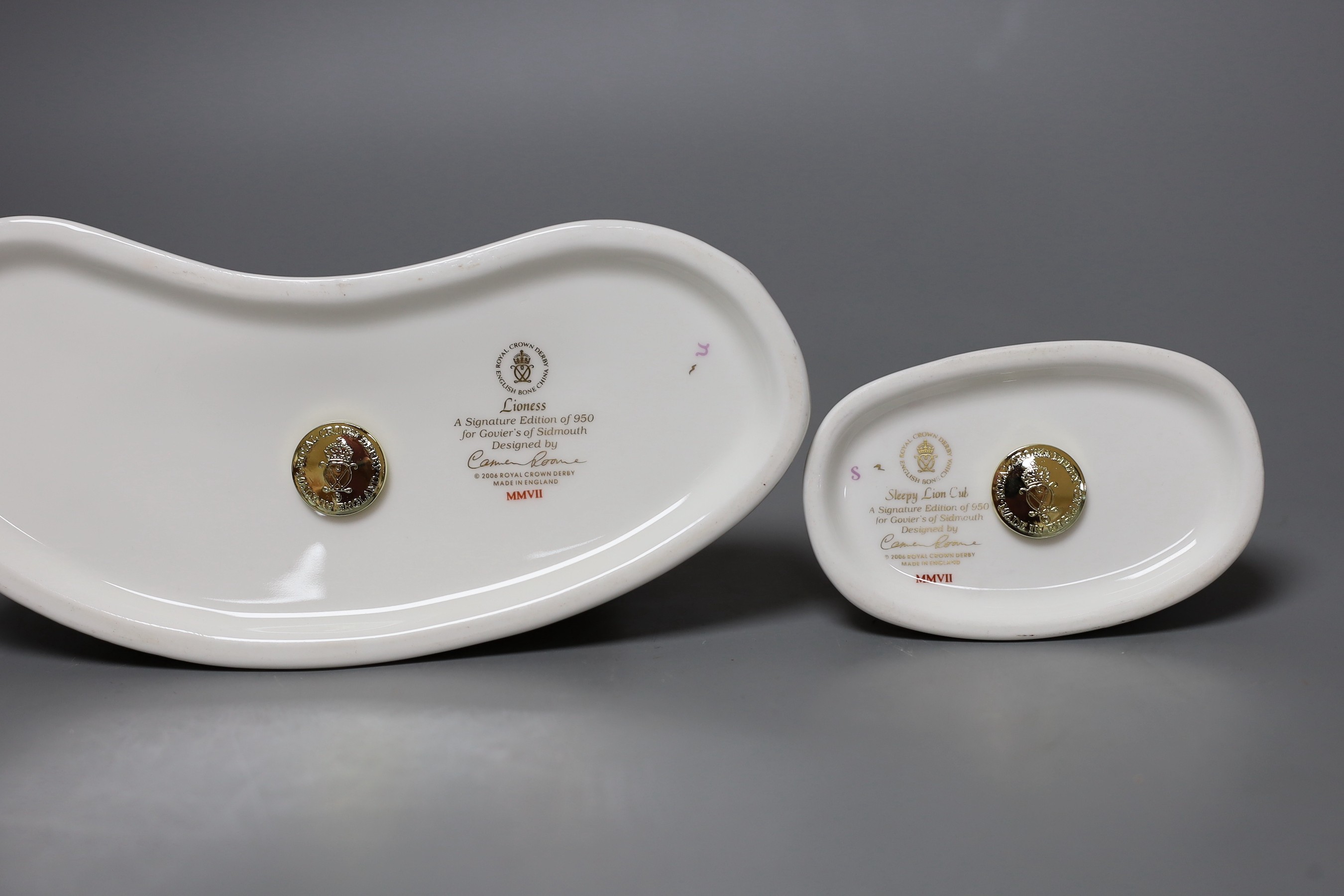 Two Royal Crown Derby paperweights - Lioness, gold stopper, boxed with certificate and Sleepy Lion Cub, gold stopper, boxed with certificate